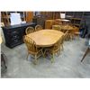 Image 1 : ROUND OAK TABLE W/ LEAF AND 6 CHAIRS