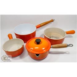 4 PIECES OF LE CREUSET ENAMELED CAST IRONWARE WITH