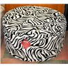 Image 1 : ROUND FABRIC ZEBRA PATTERN STORAGE OTTOMAN