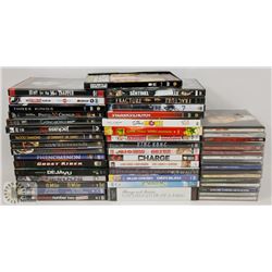 BOX OF ASSORTED CDS/DVDS.