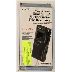 VOICE-ACTIVATED DUAL SPEED MICROCASSETTE