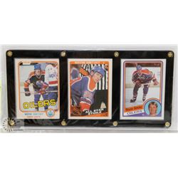 3 FRAMED EARLY 1980S WAYNE GRETZKY OILERS CARDS.
