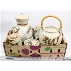 FLAT OF GLAZED POTTERY TEAPOT, JUG, CUPS AND MORE