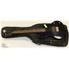Image 1 : FIRST ACT ELECTRIC BLACK GUITAR WITH SOFT CASE.