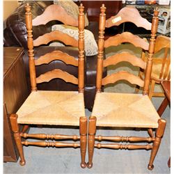 PAIR OF WOOD AND WICKER SIDE CHAIRS.