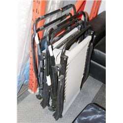 PAIR OF FOLDING PATIO LOUNGE CHAIRS.