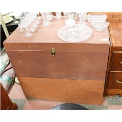 GROUP OF 2 SOLID WOOD STORAGE TRUNKS.