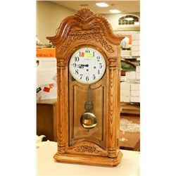 SOLID OAK HOWARD MILLER PENDULUM WALL CLOCK.