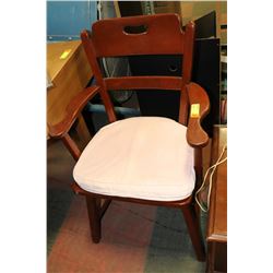 VINTAGE SOLID WOOD ARM CHAIR.