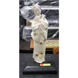 CERAMIC ASIAN ORNAMENT.