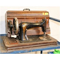 VINTAGE PORTABLE SEWING MACHINE.
