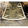 Image 1 : METAL AND GLASS PATIO TABLE.