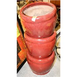 LOT OF 3 RED PLANTERS.