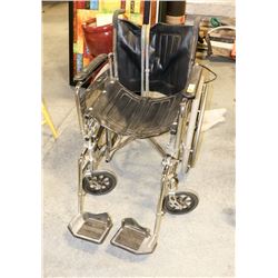 WHEEL CHAIR SOLD WITH 2 CANES.