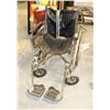 WHEEL CHAIR SOLD WITH 2 CANES.