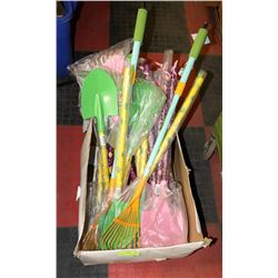 LOT OF ASSORTED KIDS RAKES AND SHOVELS