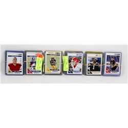 6 BUNDLES OF FOOTBALL ROOKIE CARDS SOLD TOGETHER.