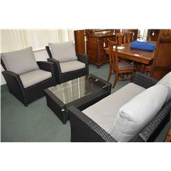 Four piece, near new simulated wicker patio suite including loveseat, two armchairs and coffee table