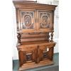 Image 1 : Antique three section court cupboard with four raised panel doors, lower section with carved cartouc