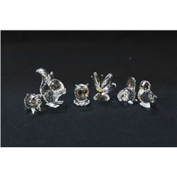 Six Swarovski crystal figures including 1 3/4" squirrel, beaver, small owl, pig, butterfly and a duc