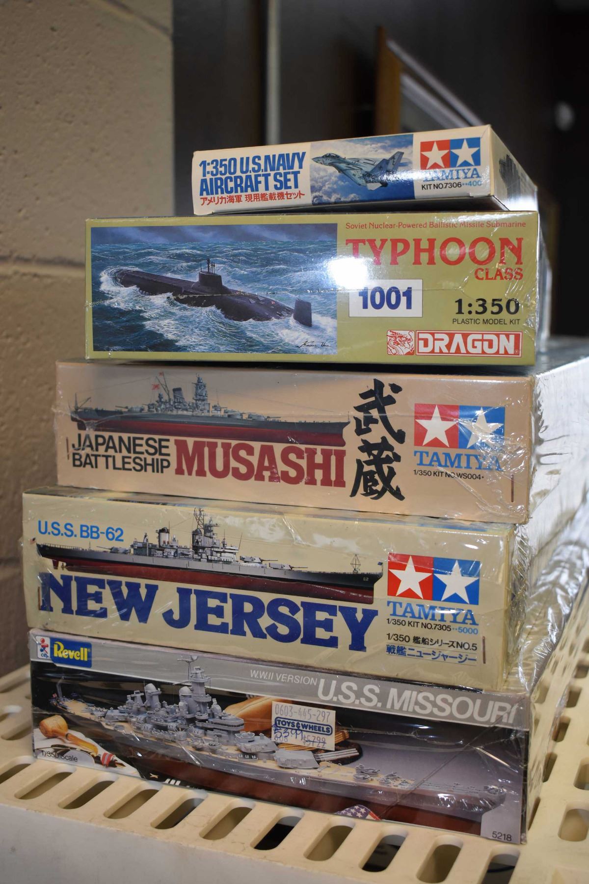 Model Kit Unassembled Five unassembled plastic model kits including three destroyer ...