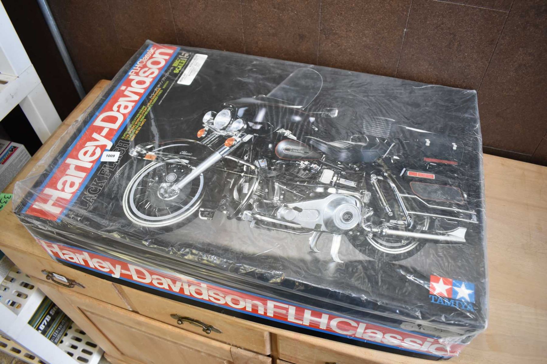 Unassembled plastic model kit of a FLH Classic Harley Davidson in a
