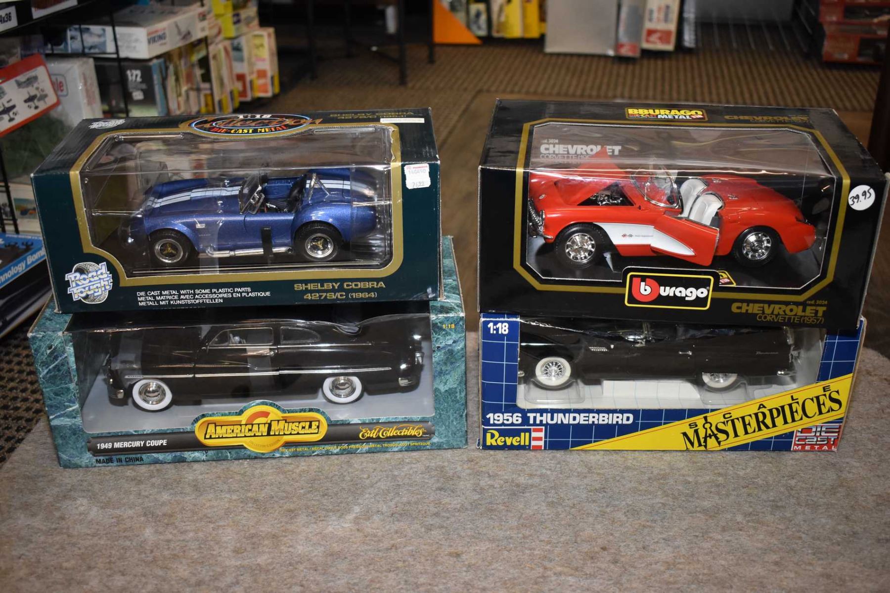 Four new in box 1:18th scale die cast cars including 1957 Corvette ...
