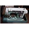Image 1 : VINTAGE NEW HOME PORTABLE SEWING MACHINE