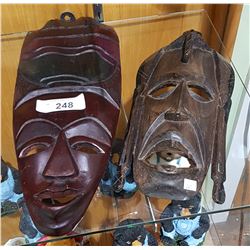 2 CARVED WOOD AFRICAN MASKS