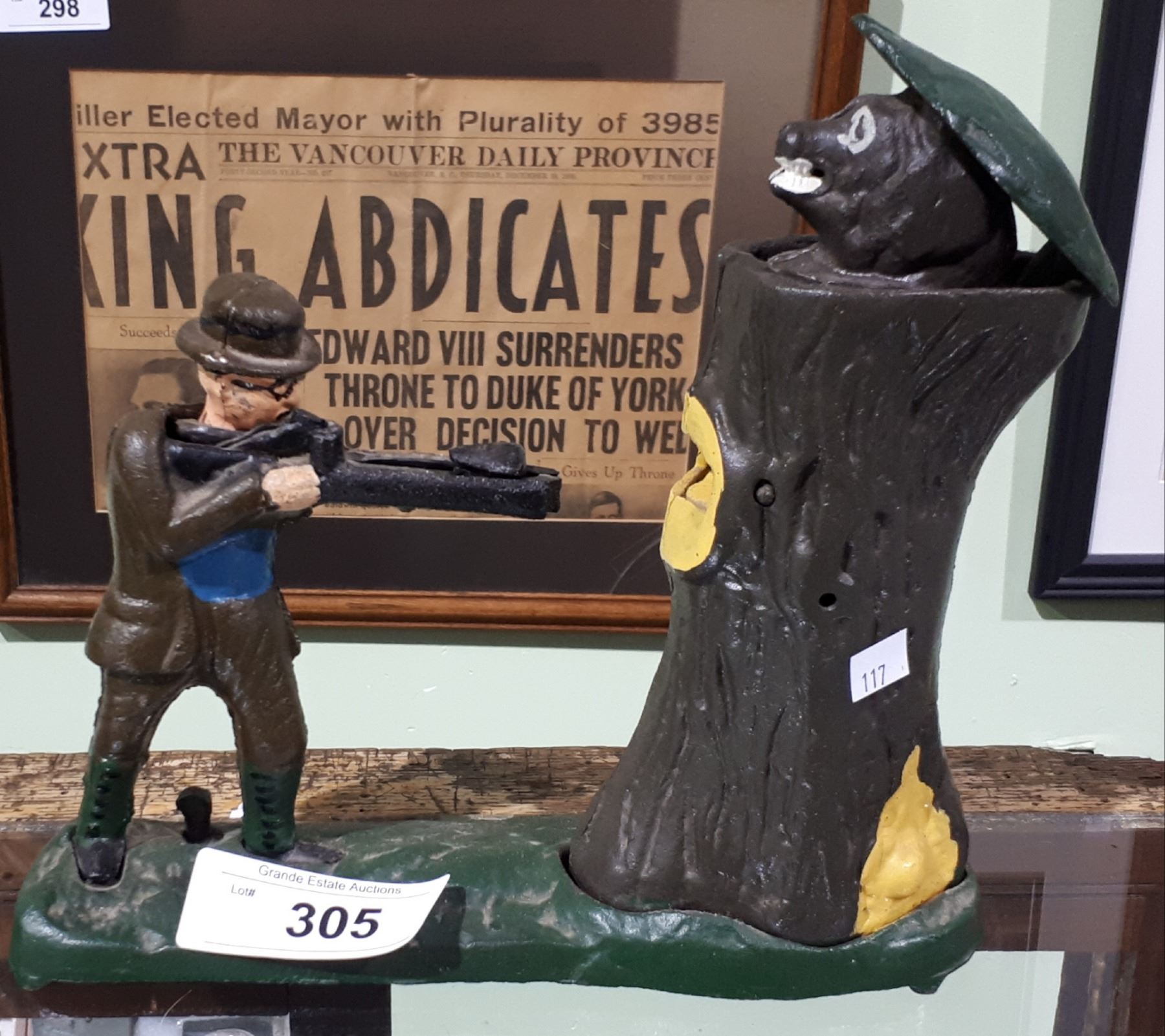 CAST IRON FIGURAL HUNTING COIN BANK