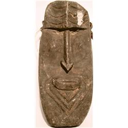 A SEPIK ANCESTOR MASK, of hardwood in ovoid form,