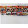 Image 1 : LOT OF 5 MATCHBOX VEHICLES (HELICOPTER, GARBAGE, STUDENT BUS, ROBOT TRUCK, FORK LIFT)