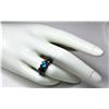 Image 1 : 7)  AQUA MARINE ZIRCON RING SET IN BLACK