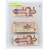 Image 1 : LOT OF THREE 1986 STOCK SHEET CANADIAN $2 BILLS