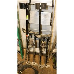 PAIR OF BLACK STILTS