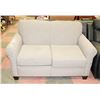 SANDY GREY FABRIC LOVESEAT.