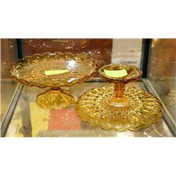 2 AMBER GLASS CAKE DISHES.