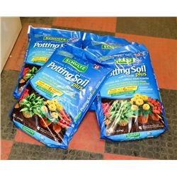 4 BAGS OF SHULTZ POTTING SOIL.