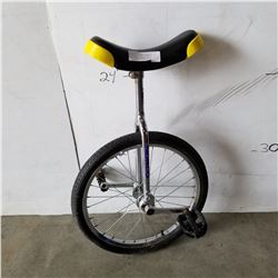 BLACK AND YELLOW UNICYCLE