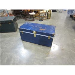 GREEN AND BLUE METAL SHIPPING TRUNKS