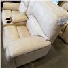 Image 2 : ASHLEY FLOOR MODEL CREAM GENUINE LEATHER POWER RECLINING AND ROCKING LOVESEAT WITH CONSOLE RETAIL $2