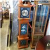 Image 2 : LARGE WOODEN 2 DOOR WORKING STAND UP CLOCK W/ PAINTED PICTURES