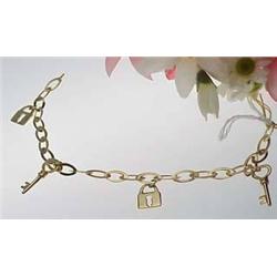 14kt yellow gold bracelet with lock and key charm