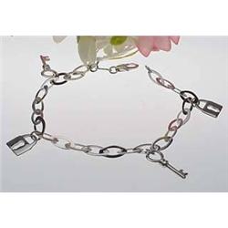 14kt white gold bracelet with lock and key charms 6.1gr