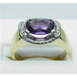 Lady's 14kt yellow gold amethyst ring with .14Ctw