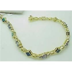 Lady's 14kt yellow gold created opal bracelet wit