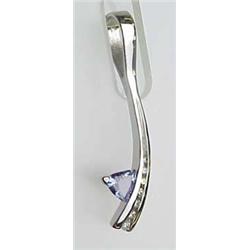 Lady's 14kt white gold designer pendant with tril