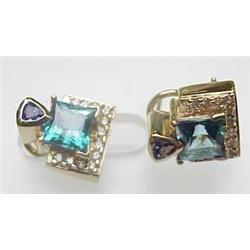 Lady's 14kt white gold designer earrings with squ