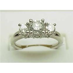 Lady's three stone diamond ring .95Ctw platinum