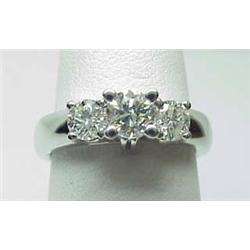 Lady's three stone diamond ring 1Ctw 14kt white g